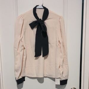 Elegant Cream Blouse with Black Accents